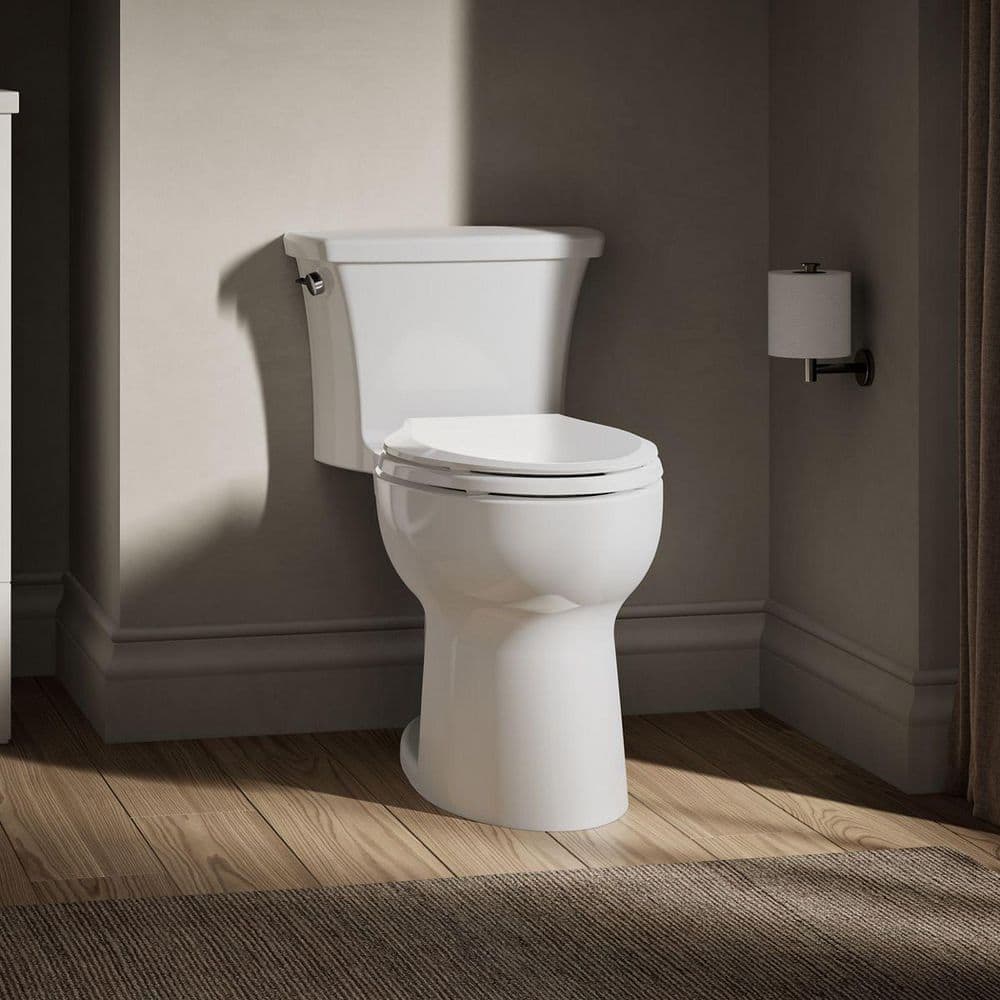 KOHLER Highline Arc 12 in. Rough In 1-Piece 1.28 GFP Single Flush Elongated Chair Height Toilet in White with Soft Close Seat (1)