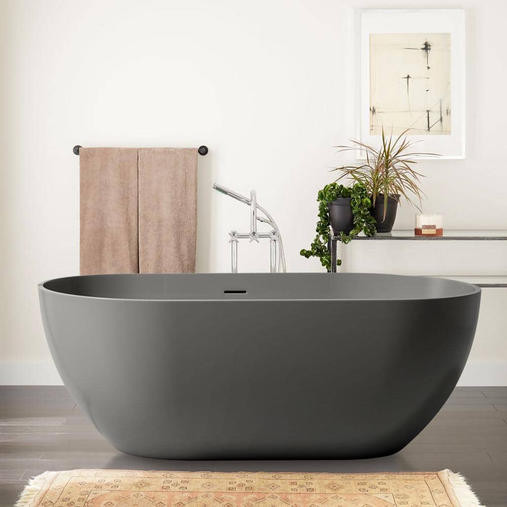 Zeus & Ruta 29.5 in. Stone Resin Soaking Bathtub with Center Drain (1)