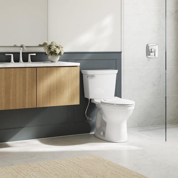 American Standard Champion Two-Piece 1.28 GPF Single Flush Elongated Chair Height Toilet with Slow-Close Seat in White