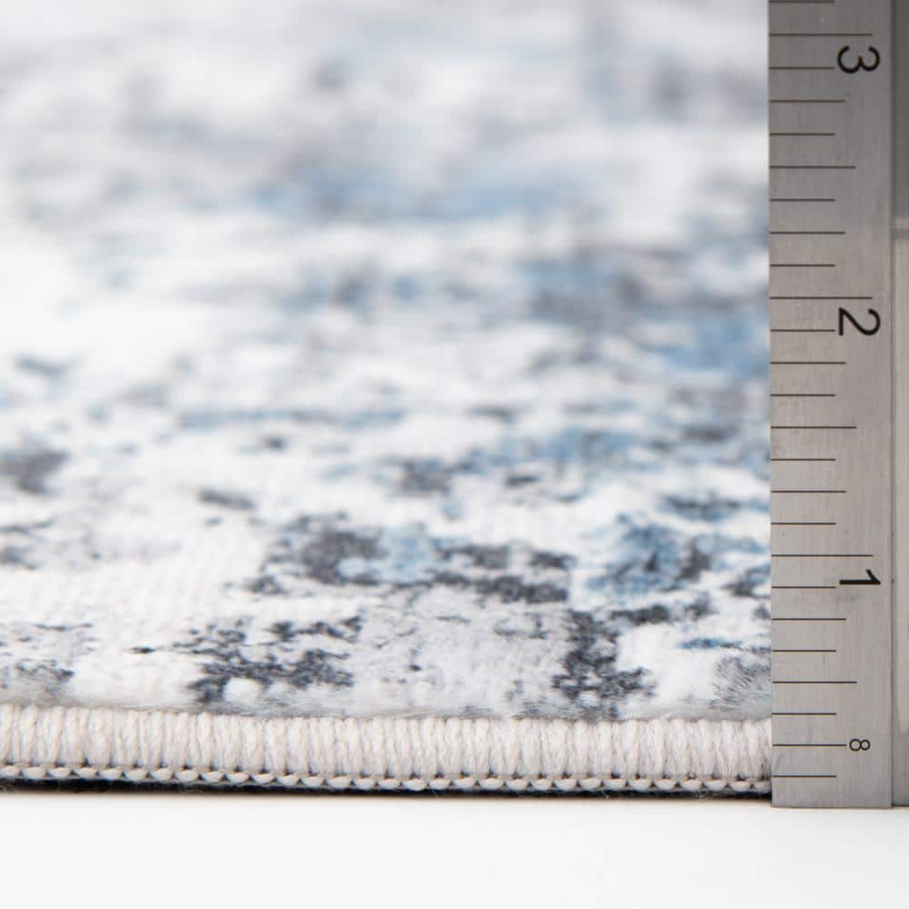 Home Decorators Collection Adare Blue 7 ft. x 9 ft. Painterly Polyester Area Rug (4)