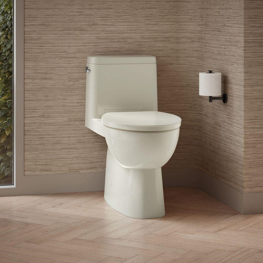 KOHLER Reach 12 inch 1-piece 1.28 GPF Single Flush Elongated Toilet in Biscuit Seat Included (1)