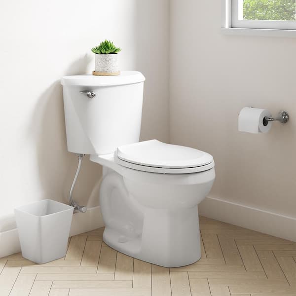 American Standard Reliant 12 in. Rough In 2-Piece 1.28 GPF Single Flush Round Toilet with Slow Close Seat in White