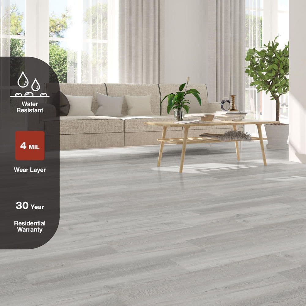TrafficMaster Emerson 4 MIL x 6 in. W x 36 in. L Grip Strip Water Resistant Luxury Vinyl Plank Flooring (24 sqft/case) (3)
